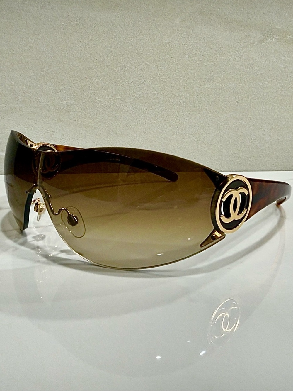 CHANEL Brown Shield Sunglasses with Gold CCs